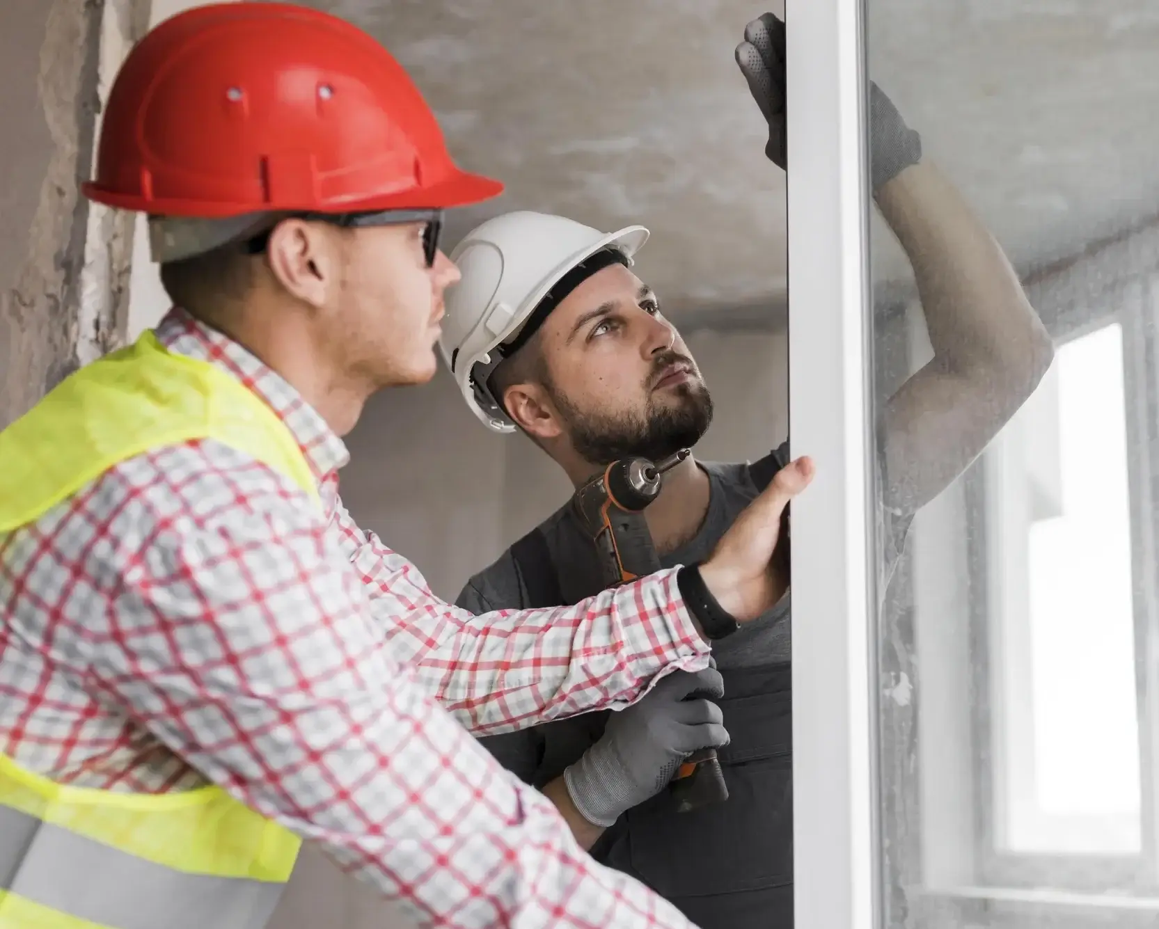 medium-shot-man-holding-drill-e1740425138590-1webp - The Local Window Guy