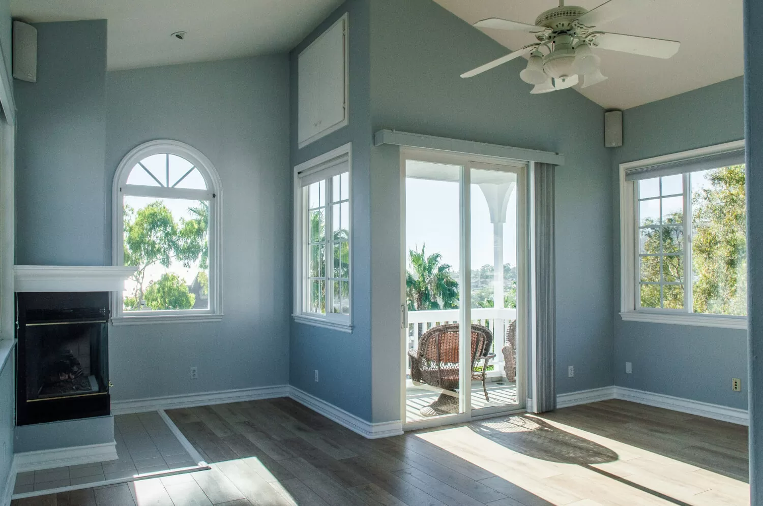 White vinyl replacement windows with Georgian grids and French doors in modern Canadian home living room